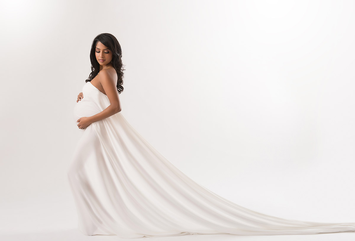 Pulled fabric shaping the contours of a pregnant woman