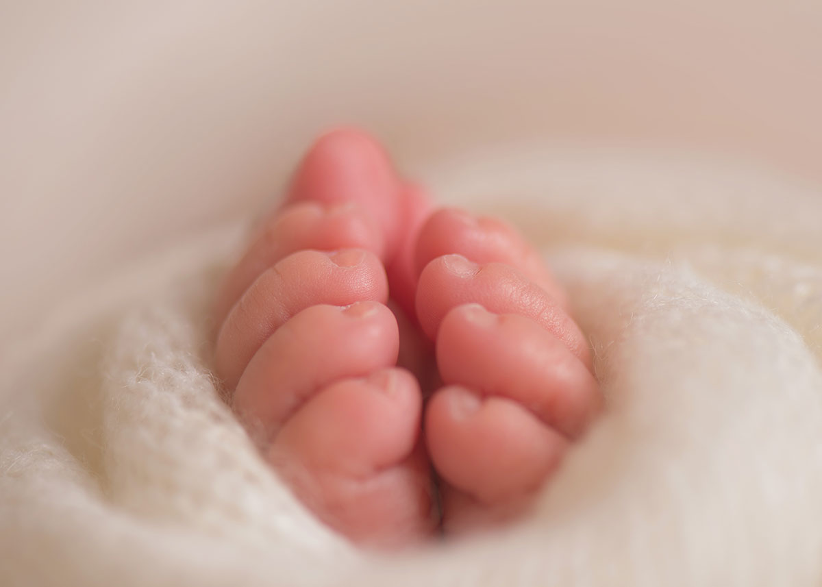 Closeup photograph of infant's toes