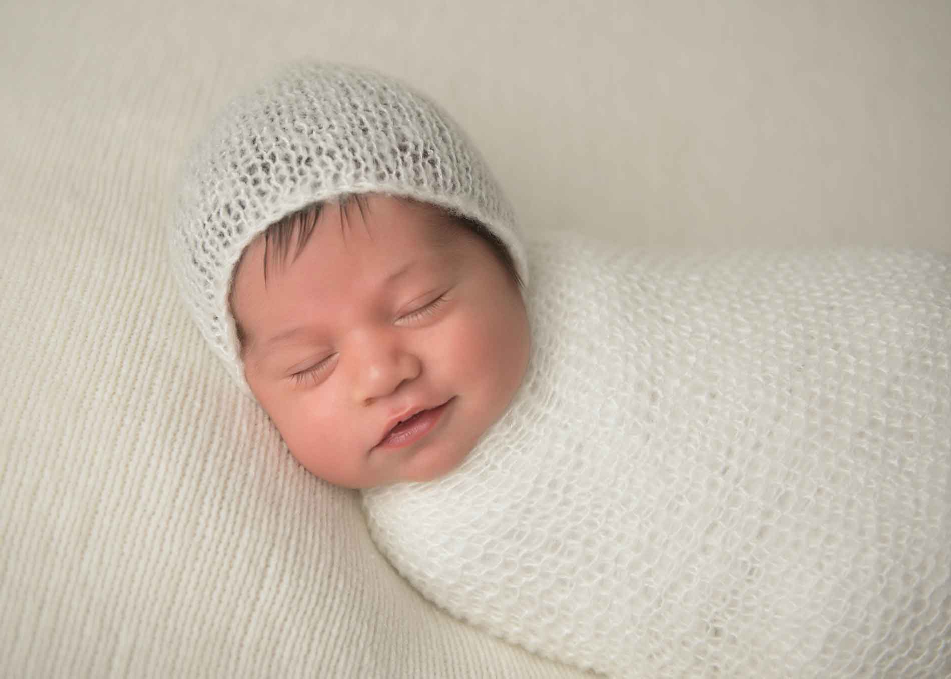 Closeup photo of a sleepy newborn