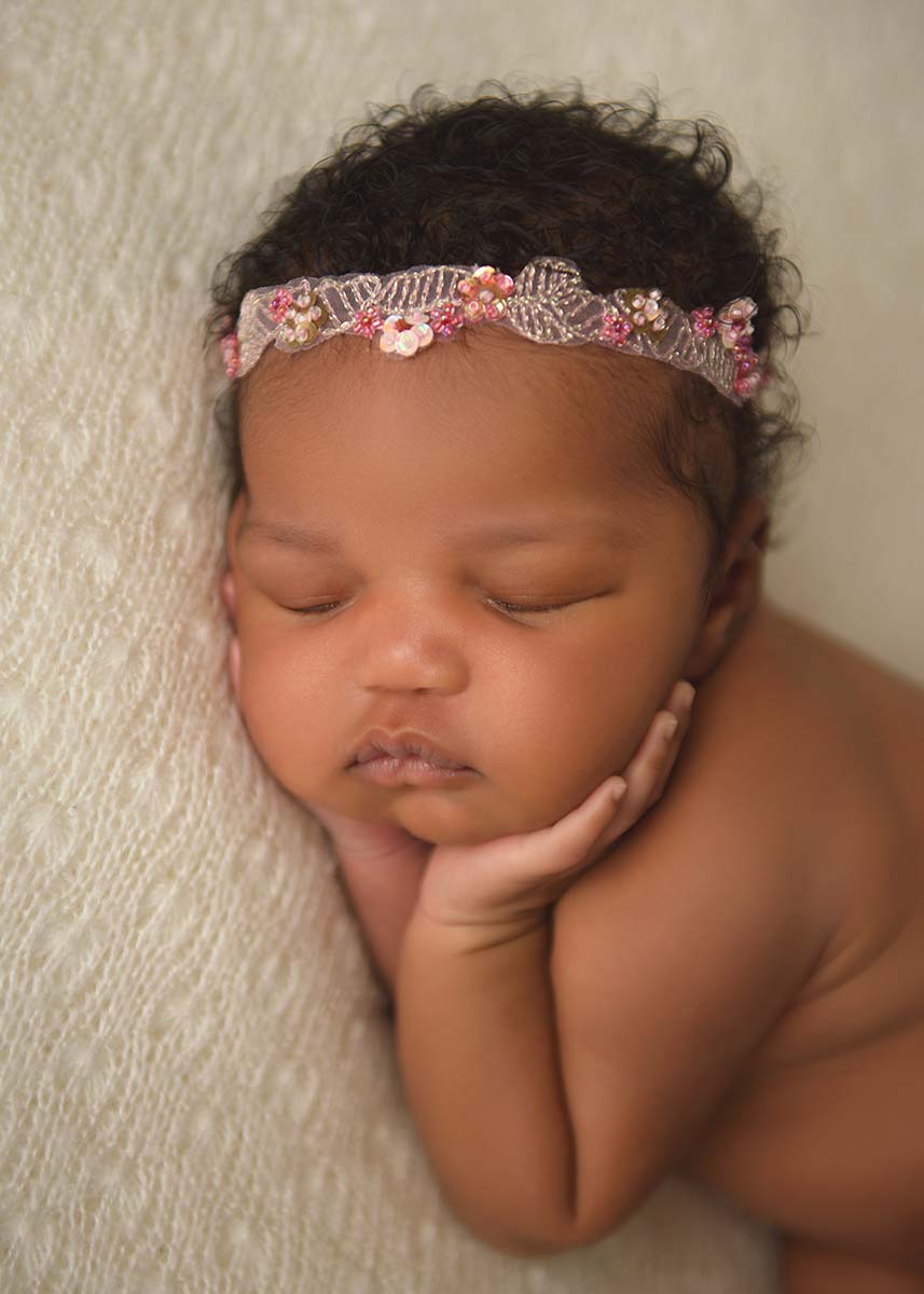 Closeup photo of an infant baby sleeping peacefully