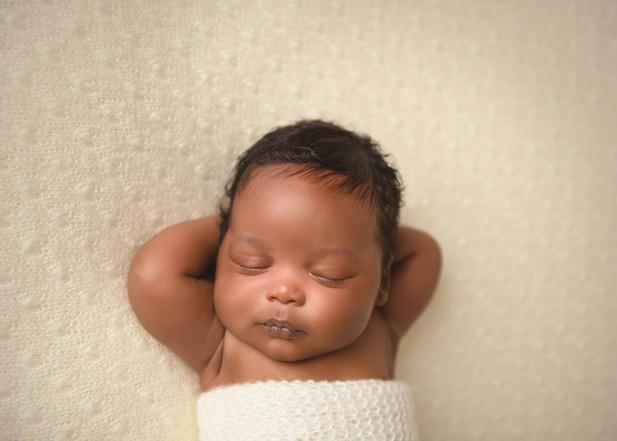 Manhattan newborn photo studio captures this incredible portrait of a sleeping infant