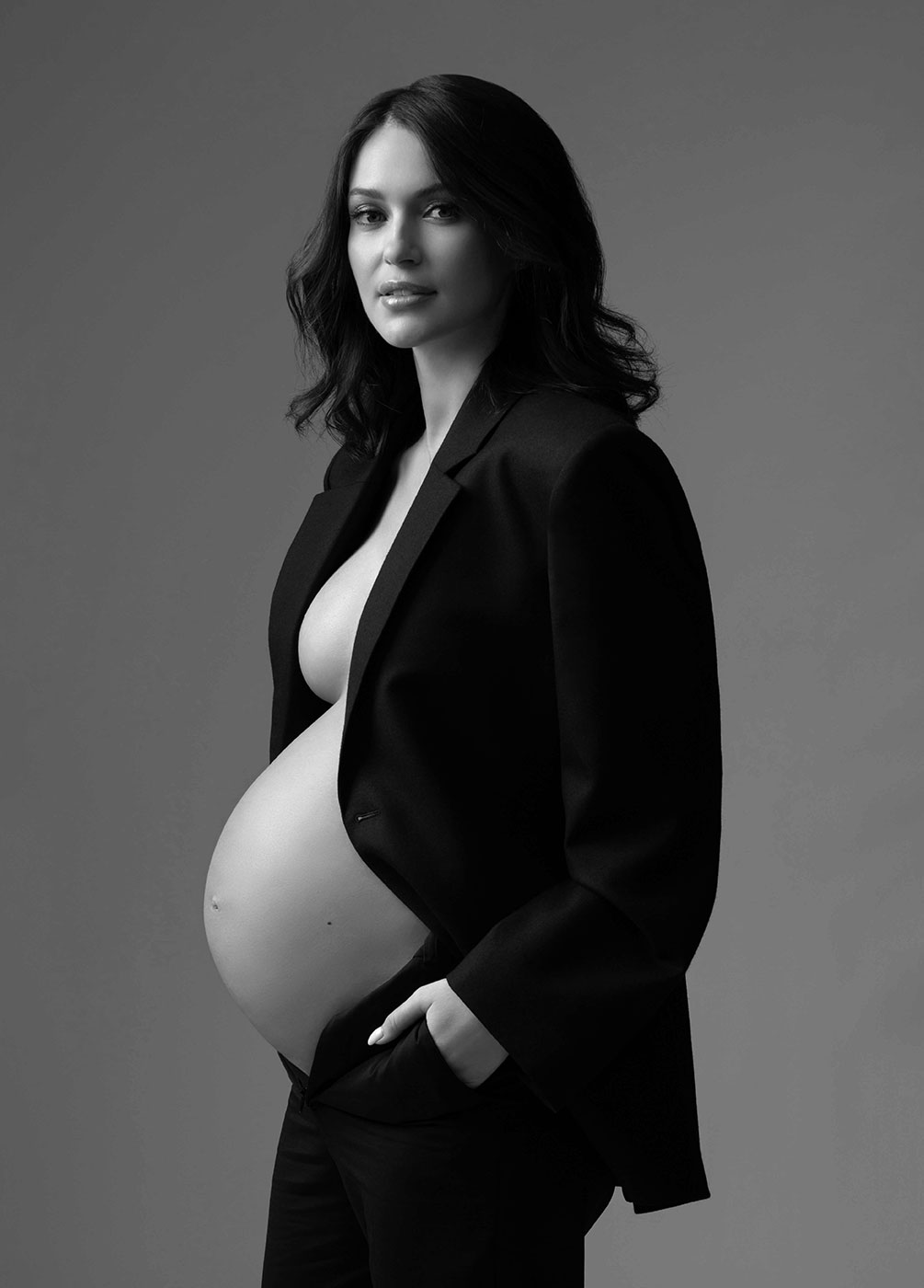 Pregnant woman wearing a blazer