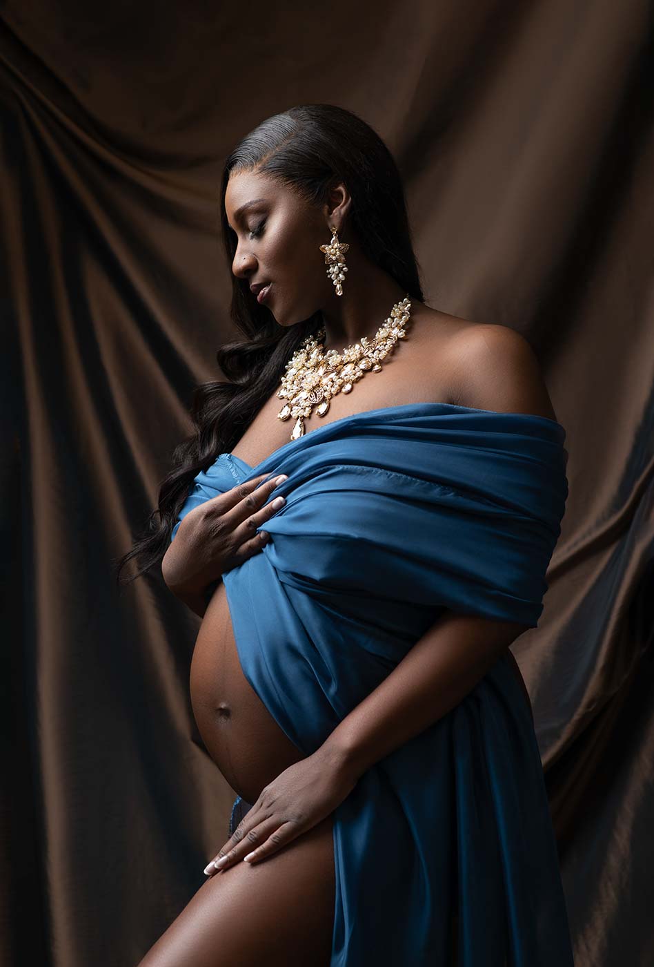 Maternity portrait as photographed by a NYC photo studio
