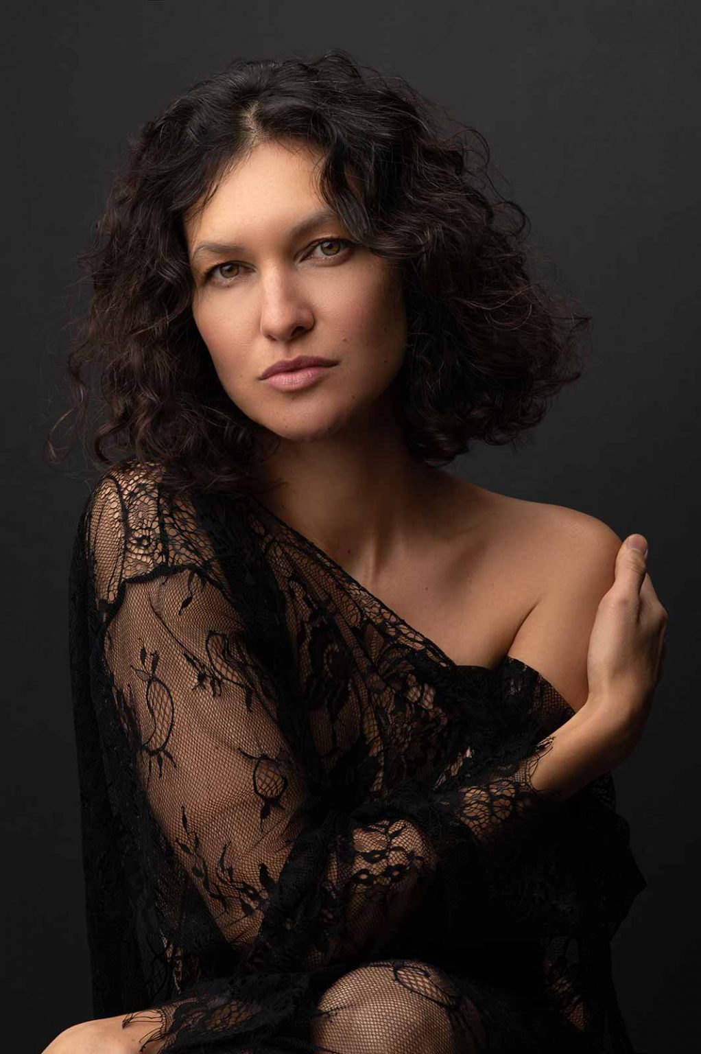 Beauty closeup photo of a woman on dark backdrop